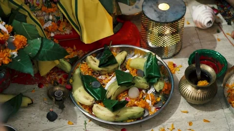 Hindu Devotees Performing Satyanarayan Pooja Ritual with Offerings Stock Footage 316893224