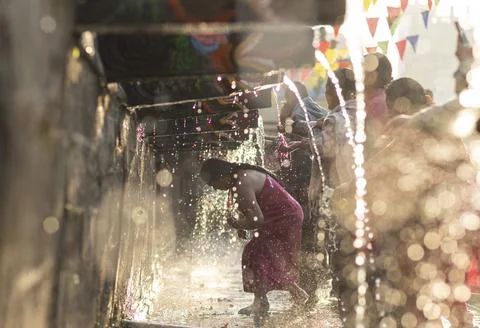 Hindu devotees take a holy bath at Balaju Purnima festival in Nepal, Kathmandu - Stock Photos