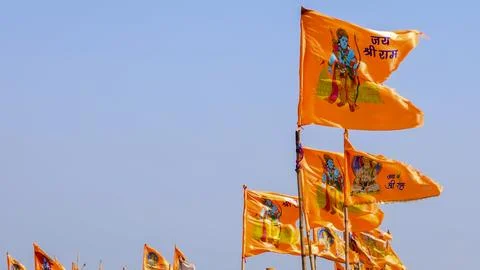 Hindu devotional flags displaying Lord Rama symbols during spiritual gather.. Stock Photos