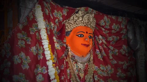 Hindu Goddess Face Idol with Red Sindoor Decoration Stock Footage 333594884