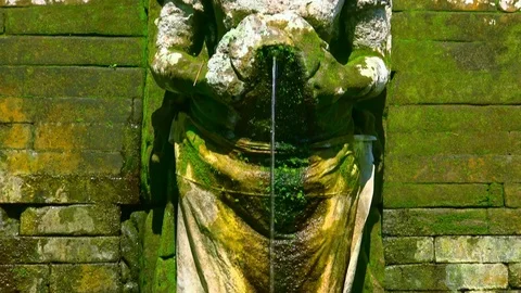 Hindu Goddesses statues making religious offerings. Goa Gajah, Bali. Indonesia Video stock 73080963