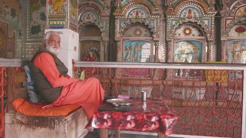 Hindu priest sitting in the temple Stock Footage 77454436