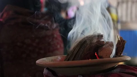 Hindu puja elements and a clay pot with coconut husks. Traditional Hindu Dh.. Stock Footage 238684068