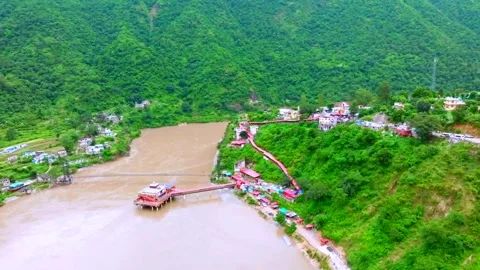 Hindu temple located on middle of  River ganga Uttarakhand, India Stock Footage 285017291