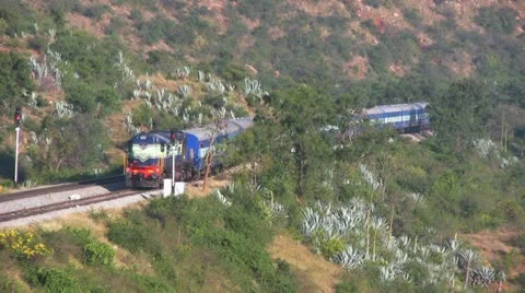 Hindupur passenger train pulls into station near Bangalore Stock Footage 20950430