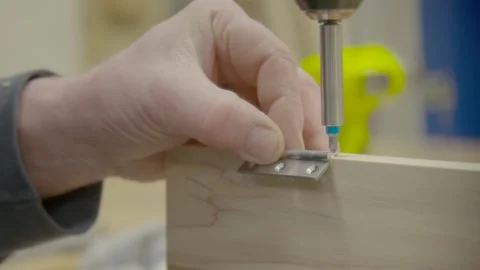 Hinge being attached to wood Stock Footage 163413451