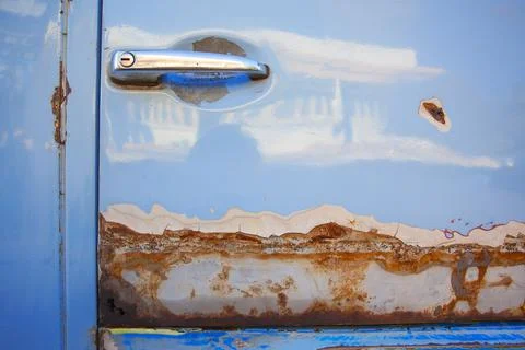 Hinge rusty old car for a long time. Photos