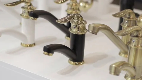 Hinged stainless bath and kitchen faucets Stock Footage 90422572