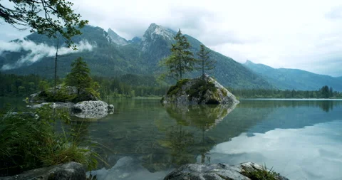 Hintersee Lake with some foliage in foreground. Berchtesgaden, Bavaria, Germany Video stock 135085448