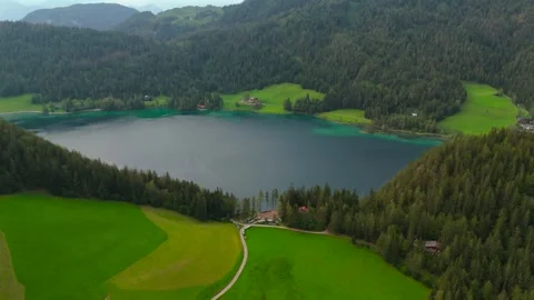Hintersteiner See mountain lake in Austria near town of Kufstein, aerial view in Stock Footage 316627741