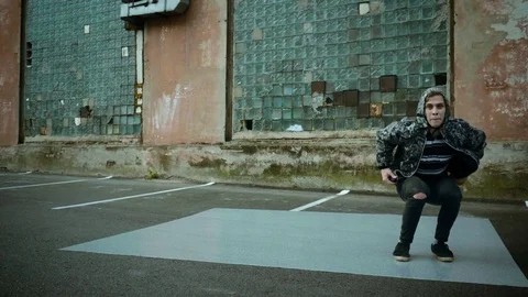 Hip-hop and breakdance. Breakdancer dancing in the street. Slow motion. HD Stock Footage 80911452