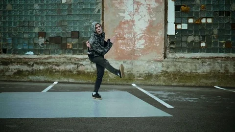 Hip-hop and breakdancing. Breakdancer dancing in the street. Slow motion. HD Stock Footage 81104180