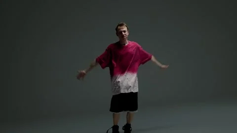 Hip hop dancer posing in a minimalist studio Stock Footage 345601568