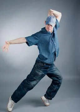 Hip-hop style dancer posing Stock Photos