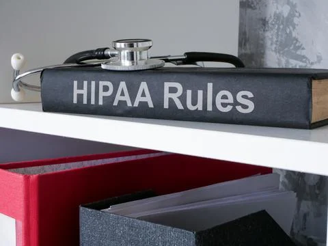 HIPAA rules with stethoscope on the shelf. 스톡 사진