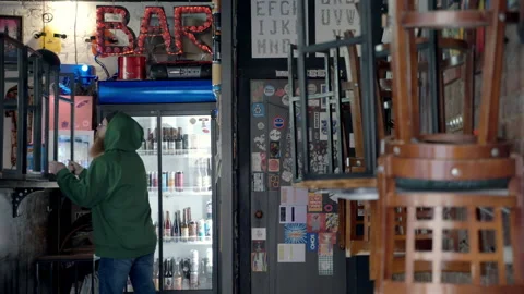 Hipster bartender preparing the bar for opening Stock Footage 220652141