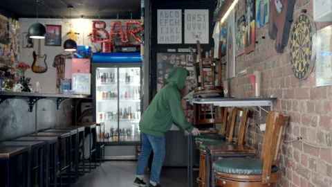 Hipster bartender preparing the bar for opening Stock Footage 220652181