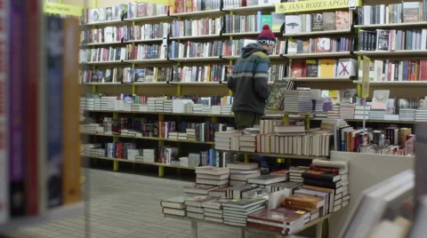 Hipster In Bookstore 4k Stock Footage 46996688
