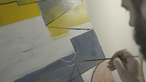 Hipster creates abstraction on canvas Stock-Footage 141750130