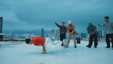 Hipster doing freeze pose while moving footstep to music at rooftop. hiphop. Stock Footage 261160231