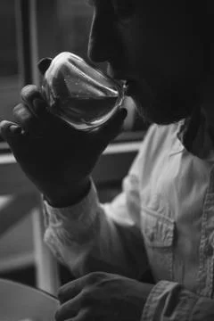 Hipster drinking tea in cafe Stock Photos