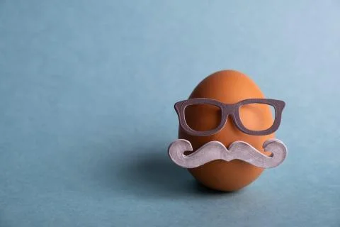 Hipster Easter eggs on a light blue background Stock Photos