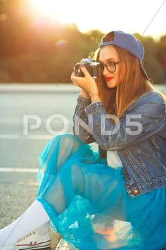 Hipster girl with old camera Stock Photos