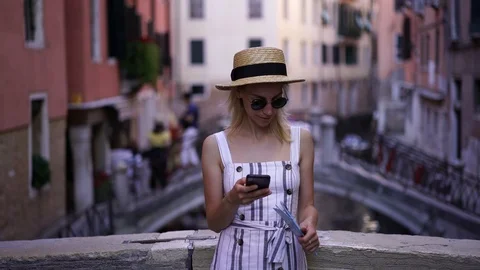 Hipster girl using smartphone Stock Footage 100201836