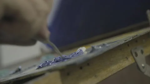 Hipster kneading paint Stock-Footage 141728663
