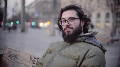 Hipster looking into the camera and smiling Stock Footage 70403967