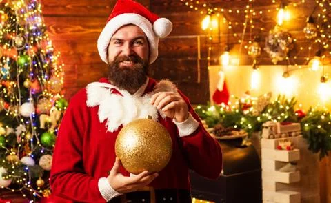 Hipster man, bearded Santa celebrate Thanksgiving day and Christmas. Home Stock Photos