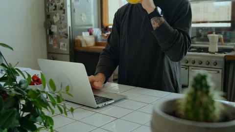 Hipster man work on laptop in kitchen home mood Video stock 144672327