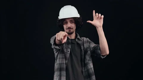 Hipster pointing to the lost gesture and pointing to the room, with a sarcastic Stock-Footage 150462560