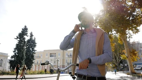 Hipster with retro bicycle Stock Footage 98212749