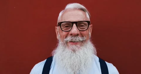 Hipster senior man smiling in front of camera Stock Footage 149117199