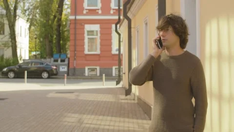 Hipster talking by smartphone Stock Footage 142456276