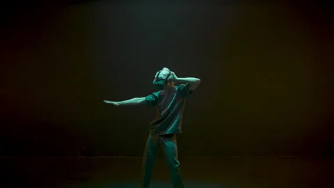 Hipster touching virtual reality objects in neon lights. Cyber player experience 스톡 동영상 211626895