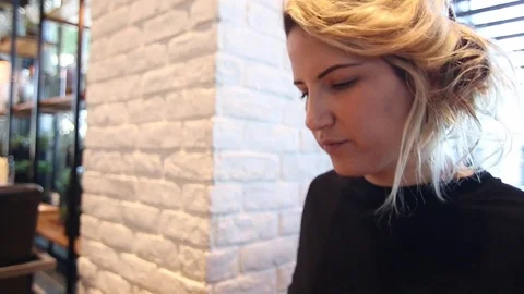 Hipster with typing machine in a cafe Stock Footage 72275811