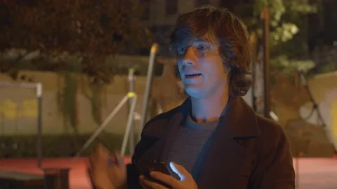 Hipster typing in smartphone Stock Footage 143586217