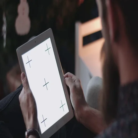 Hipster using digital tablet at New Year's Eve. Stock Footage 69289484