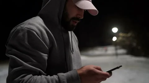 Hipster using smartphone during winter outdoor Video stock 144376812