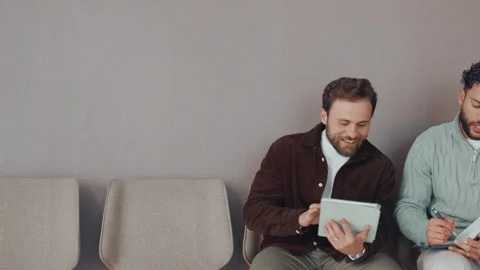 Hiring, people or tablet with notes in waiting room for interview tips Stock Footage 312494490