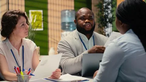 Hiring process meeting between confident candidate and a professional team Stock Photos