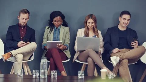 Hiring, row or group with tech in waiting room for job opportunity, online .. Foto stock