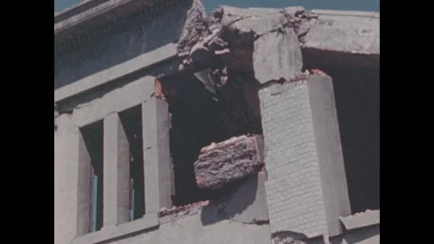 Hiroshima 1940s: Damaged multi-story concrete building with blown-out walls, Stock Footage 344140024