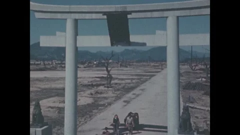 Hiroshima 1940s: A white torii gate stands amid the flattened, devastated Stock-Footage 344140267