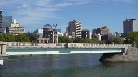 Hiroshima Atomic Bomb Dome Memorial, Aioi Bridge, and River in Japan Stock Footage 268444417