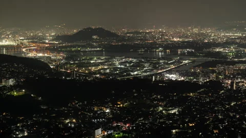 Hiroshima Cityscape at Night from an Eastern Hill  in Aki Ward (Timelapse) Stock Footage 302703501
