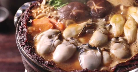 Hiroshima style oyster stew Stock Footage 239409839