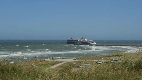 Hirthals, Denmark - July 06, 2026: Color line ferry in rough seas leaving port Stock Footage 338329443